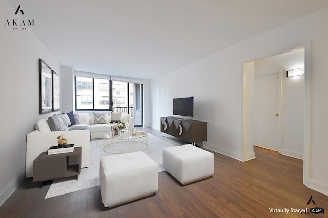343 E 74th St Unit 7-J, New York City, NY 10021 - living room with wood finished floors and baseboards