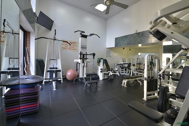 343 E 74th St Unit 7-J, New York City, NY 10021 - exercise room featuring a ceiling fan and a high ceiling