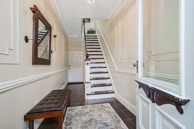 64-07 68th Ave, New York City, NY 11385 - entryway featuring stairway, dark tile patterned flooring, and baseboards