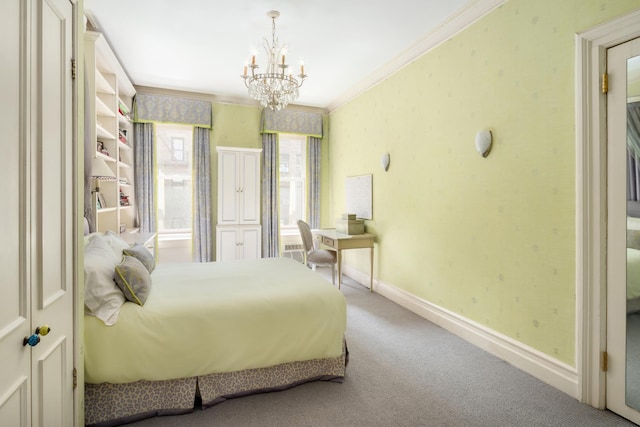 carpeted bedroom with wallpapered walls, crown molding, baseboards, and a notable chandelier