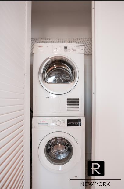 22 N 6th St Unit 20-D, New York City, NY 11249 - laundry area with stacked washer / dryer