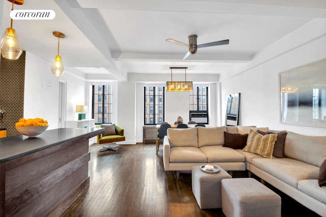 201 W 16th St Unit 12Dg, New York City, NY 10011 - living area featuring dark wood finished floors, a ceiling fan, a chandelier, and beam ceiling