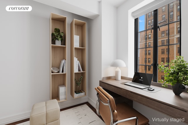 201 W 16th St Unit 12Dg, New York City, NY 10011 - office featuring baseboards and light wood-style flooring
