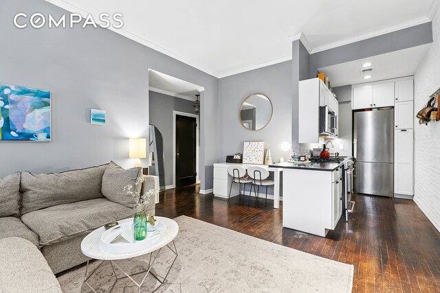 458 W 23rd St Unit 3A, New York City, NY 10011 - living room with crown molding, dark wood-style flooring, and baseboards