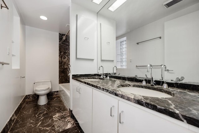 full bath with a sink, visible vents, toilet, and marble finish floor