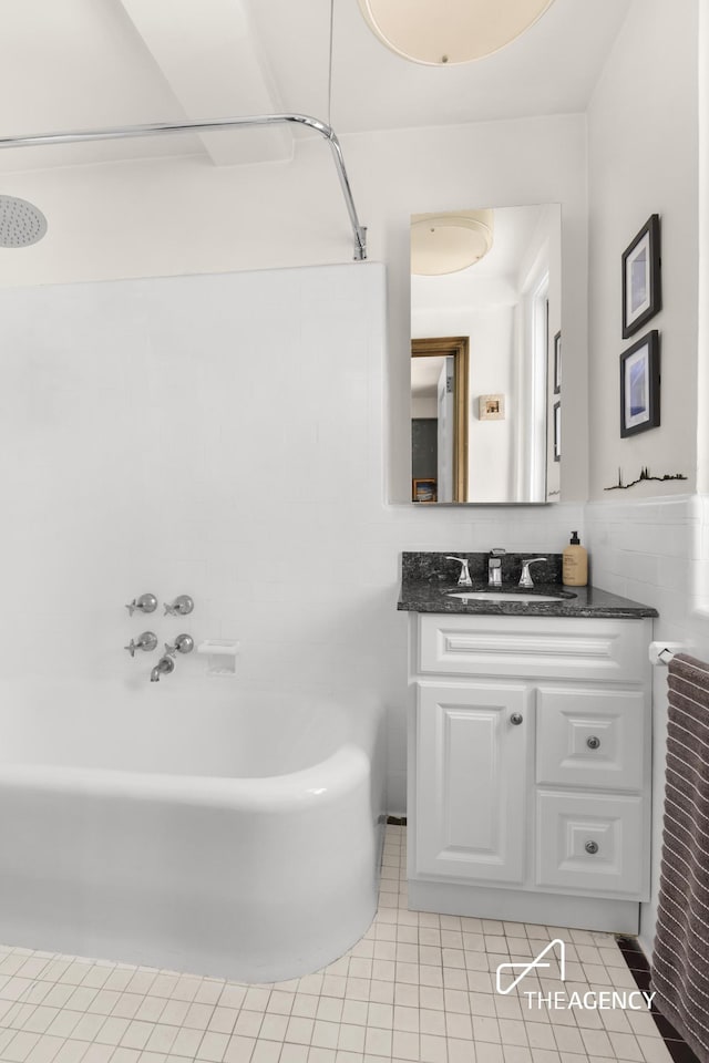 333 E 53rd St Unit 10C, New York City, NY 10022 - bathroom featuring vanity, tile patterned floors, and  shower combination