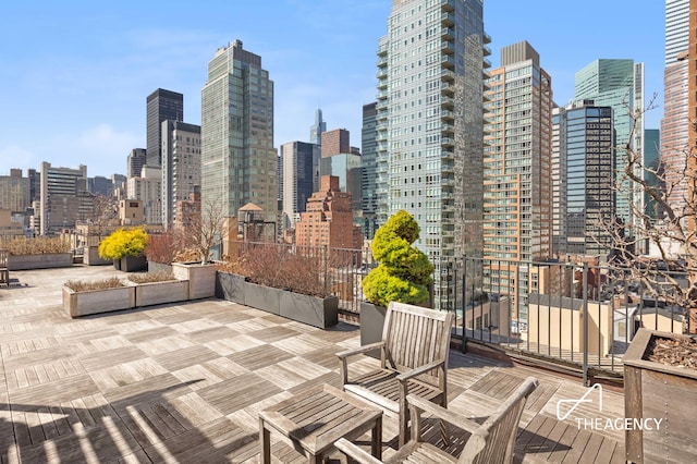 333 E 53rd St Unit 10C, New York City, NY 10022 - view of patio featuring a skyline view