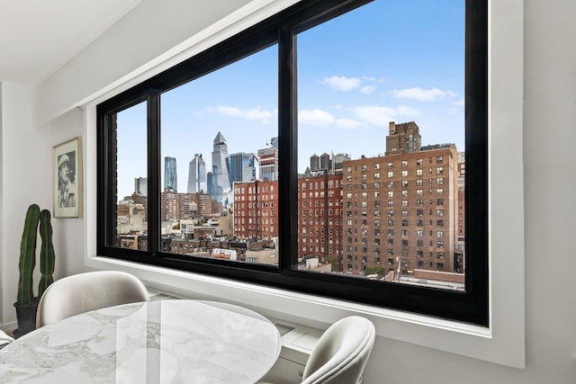 dining room featuring a view of city