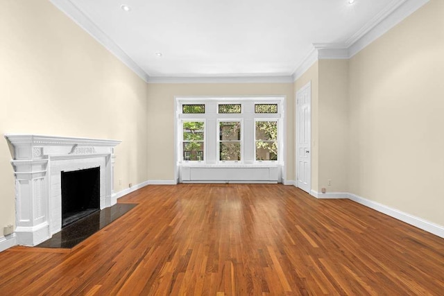 59 E 73rd St, New York City, NY 10021 - unfurnished living room with wood finished floors, ornamental molding, baseboards, and a fireplace with flush hearth