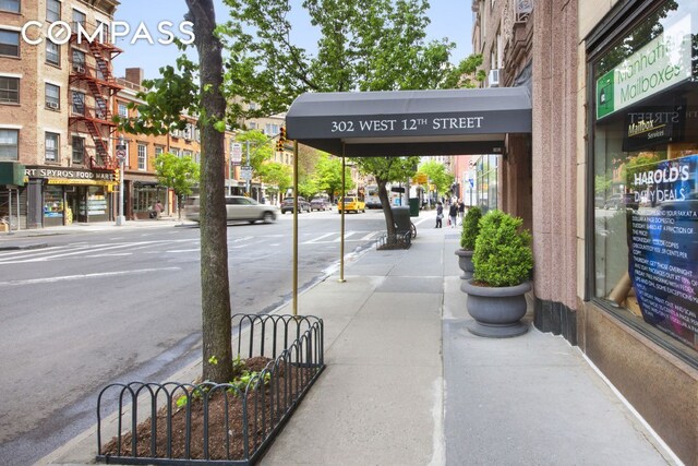 302 W 12th St Unit 5G, New York City, NY 10014 - view of street featuring street lighting, curbs, and sidewalks