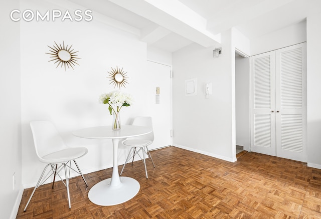 dining space with baseboards
