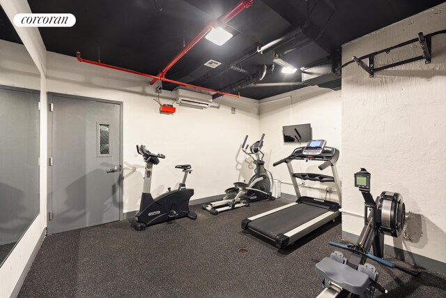 236 17th St Unit 6C, New York City, NY 11215 - exercise room featuring an AC wall unit