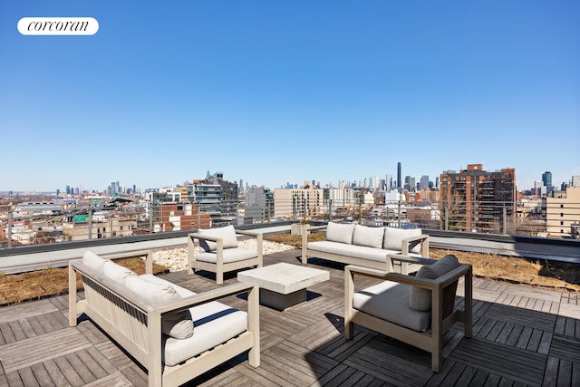 236 17th St Unit 6C, New York City, NY 11215 - wooden terrace with a skyline view and an outdoor hangout area
