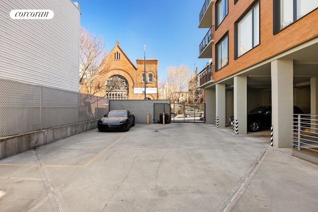 236 17th St Unit 6C, New York City, NY 11215 - view of car parking featuring a gate