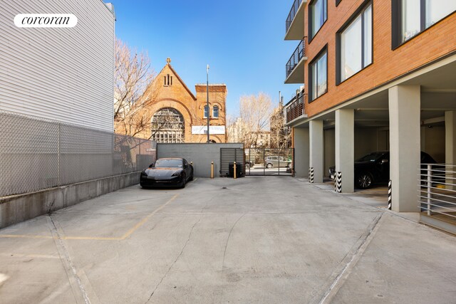 236 17th St Unit 6C, New York City, NY 11215 - view of car parking featuring a gate