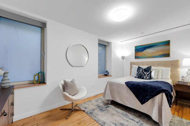 554 Broome St Unit 4Thfloor, New York City, NY 10013 - bedroom with wood-type flooring and baseboards