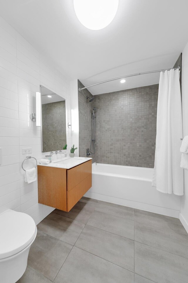 554 Broome St Unit 4Thfloor, New York City, NY 10013 - bathroom featuring shower / bath combo, vanity, toilet, and tile patterned flooring