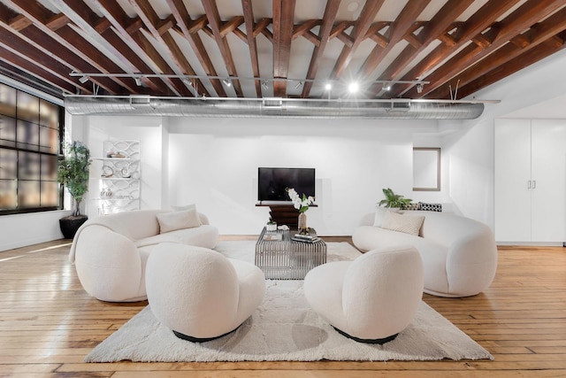 554 Broome St Unit 4Thfloor, New York City, NY 10013 - living area featuring hardwood / wood-style flooring and baseboards