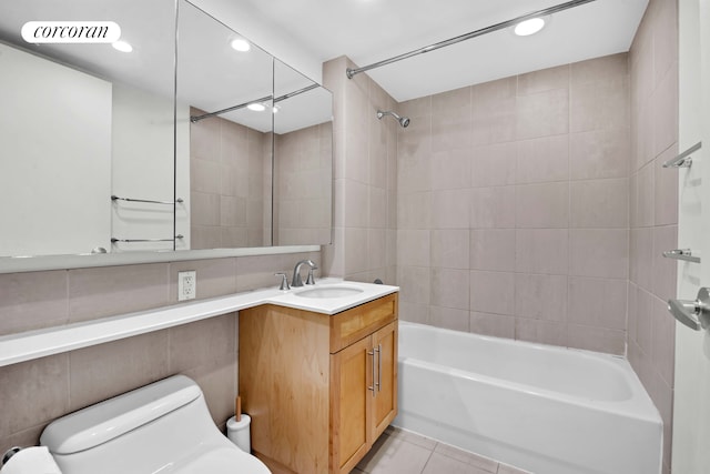 full bath featuring  shower combination, toilet, tile patterned flooring, vanity, and recessed lighting