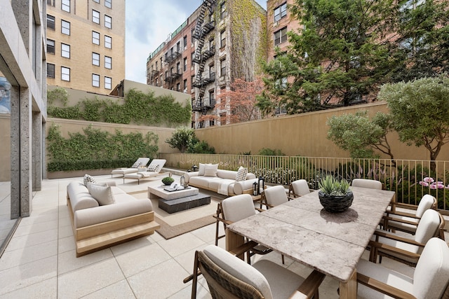 251 W 14th St Unit 1-A, New York City, NY 10011 - view of patio with an outdoor living space and outdoor dining area