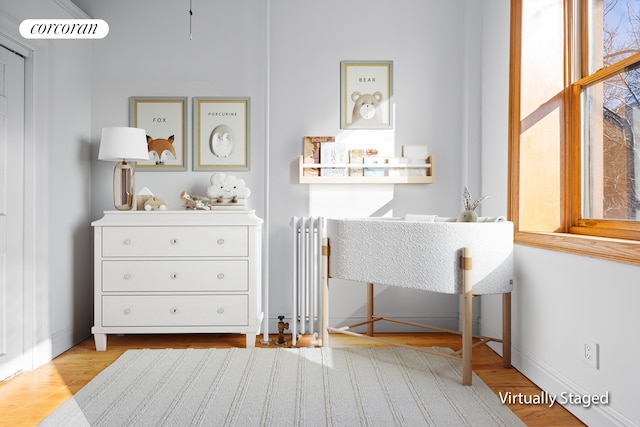 sitting room featuring wood finished floors and baseboards
