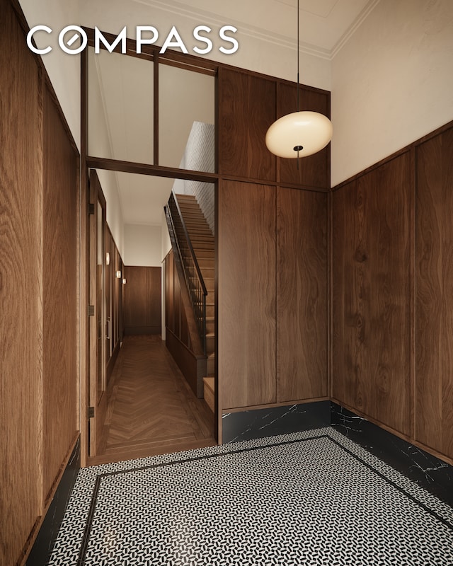 stairs with wood walls