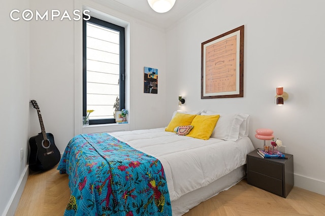 129 Malcolm X Blvd Unit 1, New York City, NY 11221 - bedroom featuring baseboards and ornamental molding