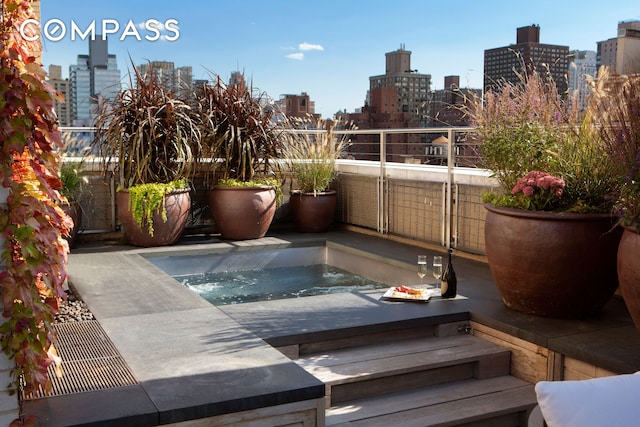 823 Park Ave Ph, Ph, New York City, NY 10021 - view of swimming pool featuring a view of city and a jacuzzi