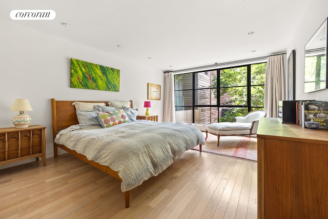 67 Dean St, New York City, NY 11201 - bedroom featuring light wood-style floors and expansive windows