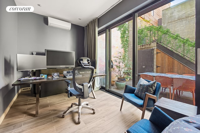 67 Dean St, New York City, NY 11201 - office space featuring an AC wall unit, wood finished floors, and baseboards