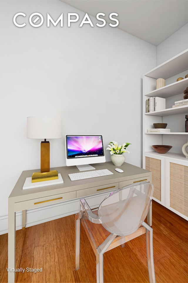 office space with wood finished floors
