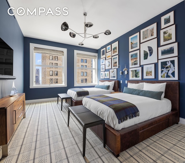 2 Park Pl Unit 35A, New York City, NY 10007 - carpeted bedroom featuring baseboards, multiple windows, and a chandelier