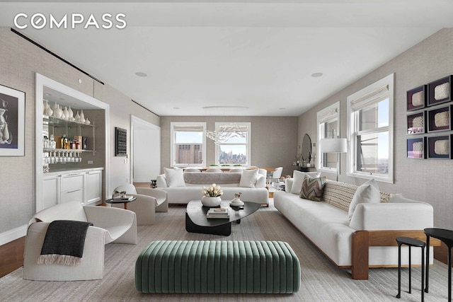 2 Park Pl Unit 35A, New York City, NY 10007 - living room with baseboards, a chandelier, and a bar