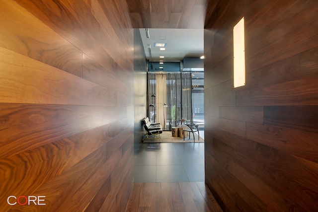 305 W 16th St Unit 4E, New York City, NY 10011 - hall with wooden walls and expansive windows