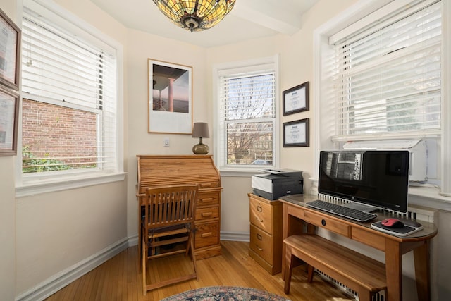 86-10 34th Ave Unit 113, New York City, NY 11372 - office space with healthy amount of natural light, light wood-type flooring, and baseboards