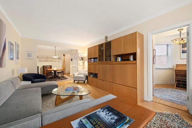 86-10 34th Ave Unit 113, New York City, NY 11372 - living area with light wood-style floors and baseboards