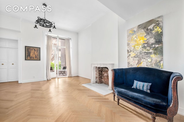 57 E 73rd St Unit 1/2, New York City, NY 10021 - living area featuring baseboards, a high end fireplace, and ornamental molding