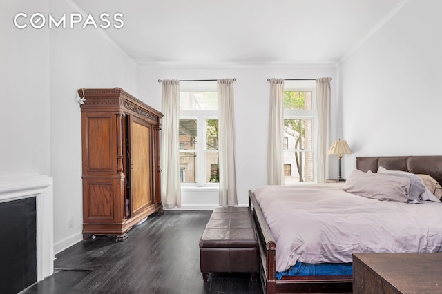 57 E 73rd St Unit 1/2, New York City, NY 10021 - bedroom featuring dark wood finished floors, crown molding, and baseboards