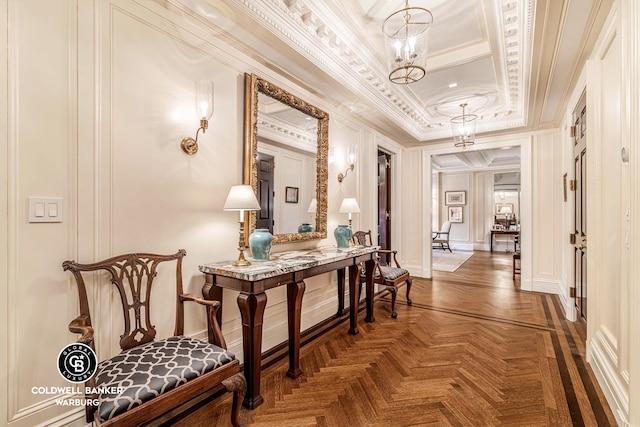 corridor with crown molding and a decorative wall