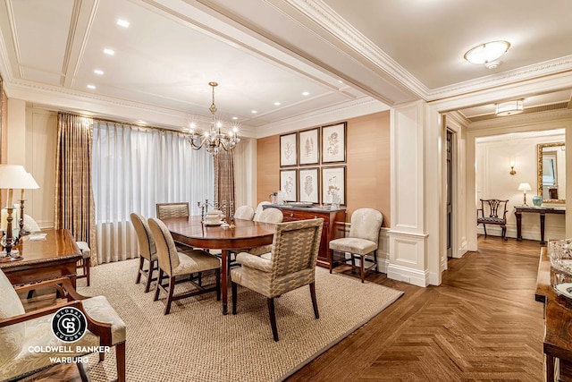 dining area with ornamental molding, a chandelier, and a decorative wall