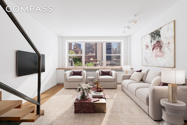 living area featuring wood finished floors