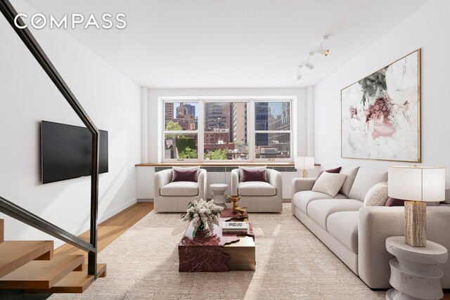 221 E 50th St Unit 6D/7D, New York City, NY 10022 - living area with wood finished floors