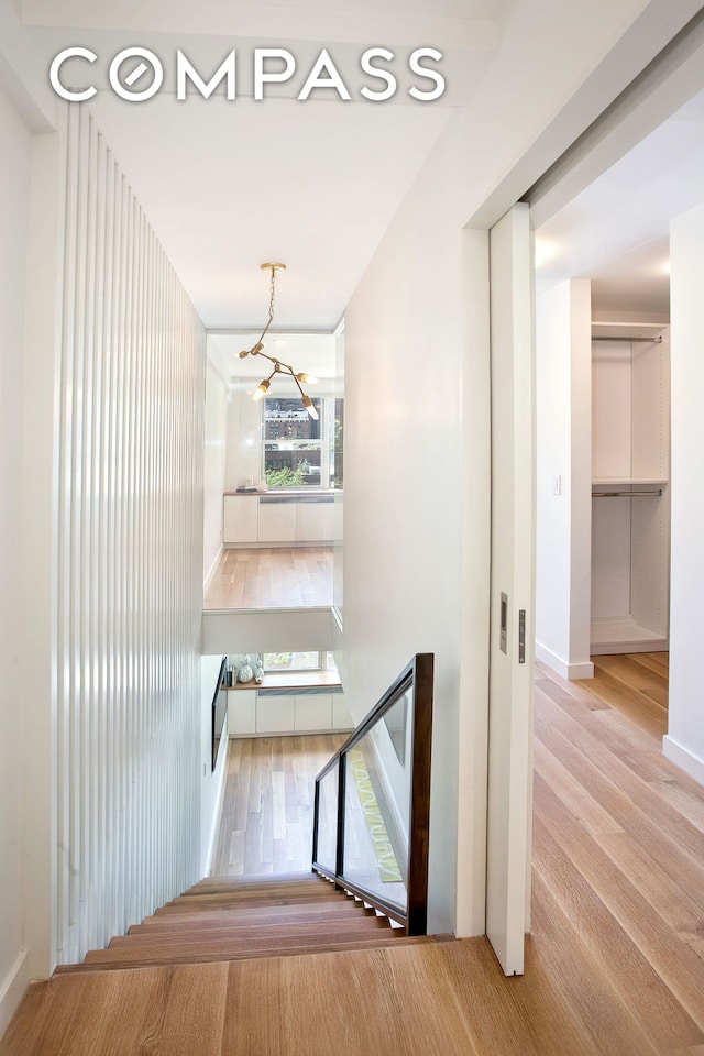 221 E 50th St Unit 6D/7D, New York City, NY 10022 - staircase with wood finished floors