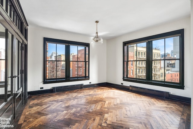 211 Elizabeth St Unit 5N, New York City, NY 10012 - unfurnished room with baseboards