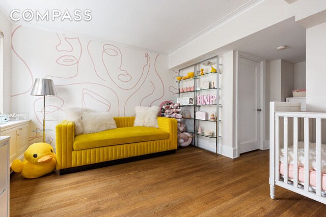 bedroom with wood finished floors