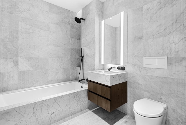 130 William St Unit 38D, New York City, NY 10038 - full bathroom featuring toilet, vanity, marble finish floors, a combined bath / shower with marble appearance, and tile walls