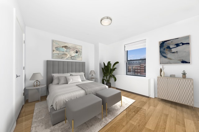 bedroom with light wood-style flooring