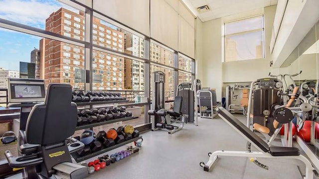 160 W 66th St Unit 37F, New York City, NY 10023 - gym featuring a view of city and plenty of natural light