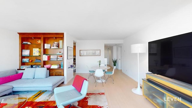 living area featuring wood finished floors