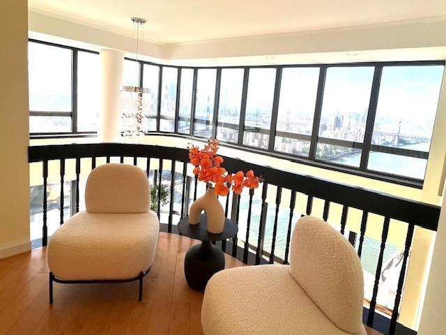 530 E 76th St Unit Ph35H36H, New York City, NY 10021 - full bath with a jetted tub, marble finish floor, tile walls, and vanity